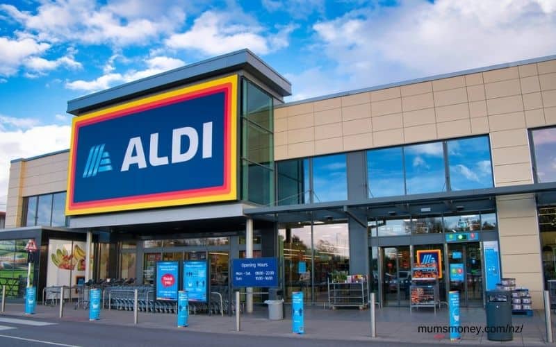Image of front of Aldi store with blue sky in background