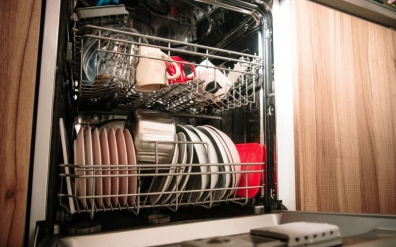 Photo of a dishwasher filled with dishes