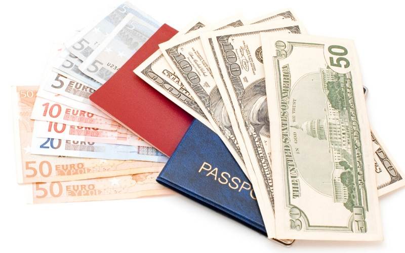 Passports and cash in dollars and euros