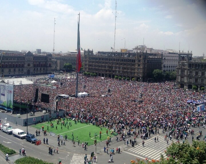 Watching Mexico play at the 2014 FIFA World Cup in Mexico City's Zocalo. Travel gives you space to think bigger.