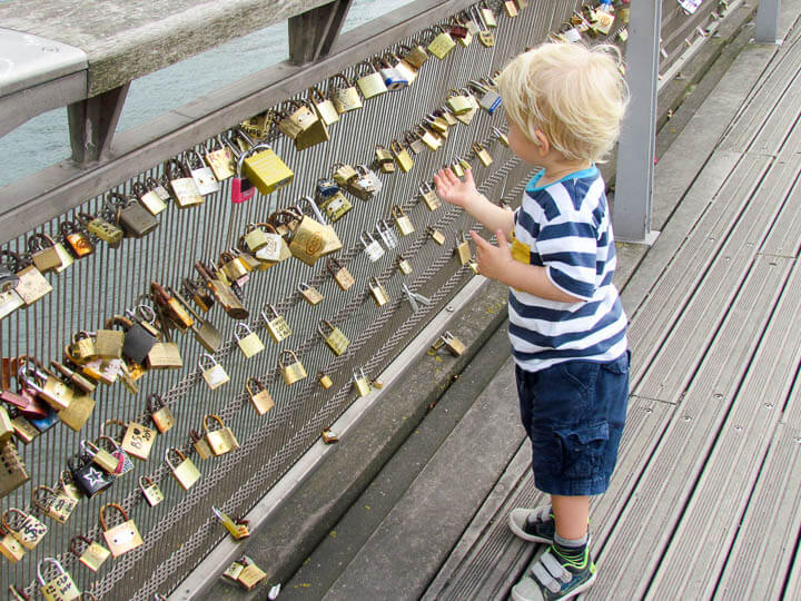 The Love Lock Bridge in Paris, France. Family travel with kids.